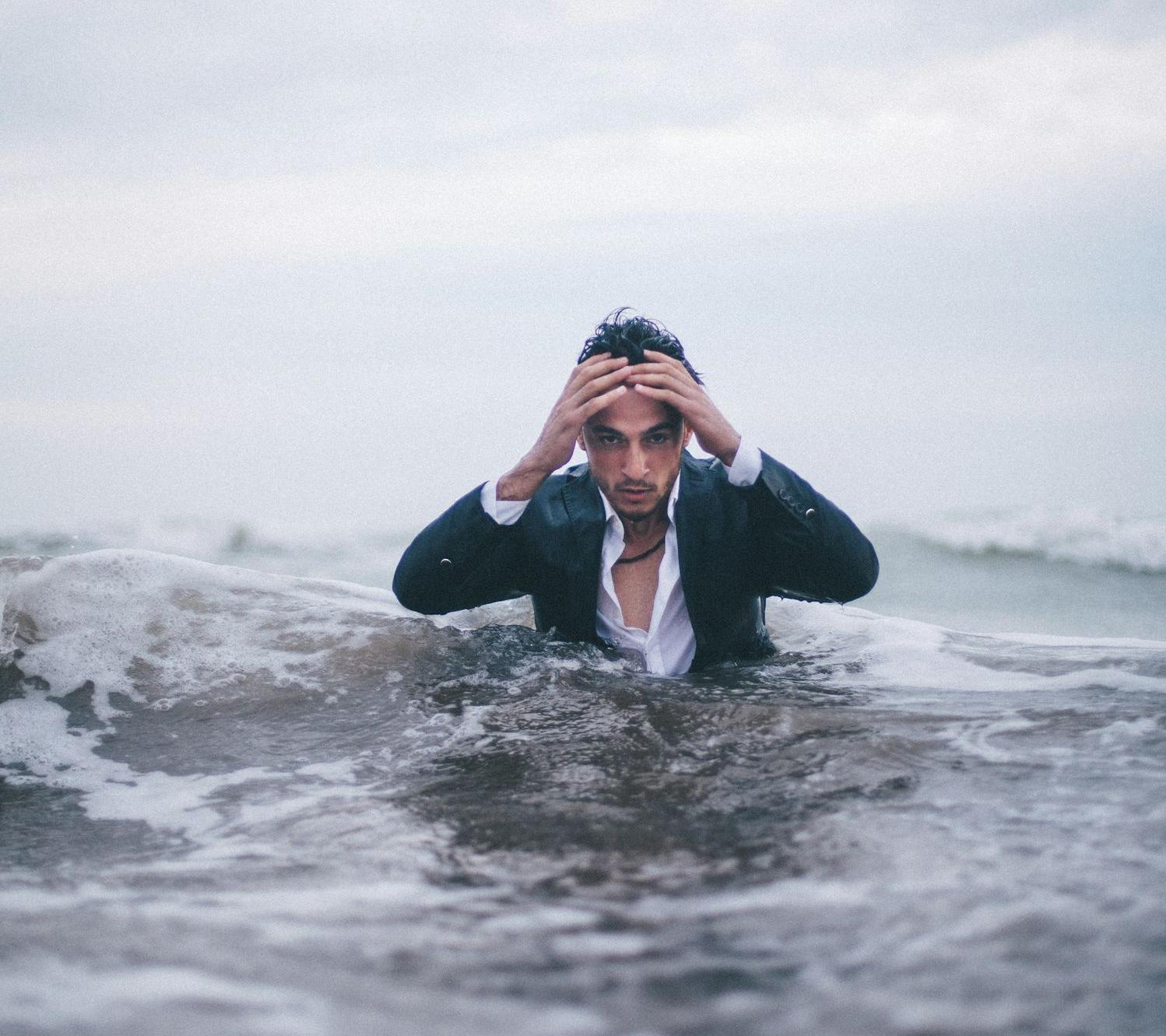 man on body of water during daytime